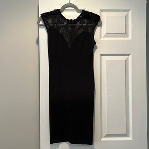 Black mini dress with netting and jewels